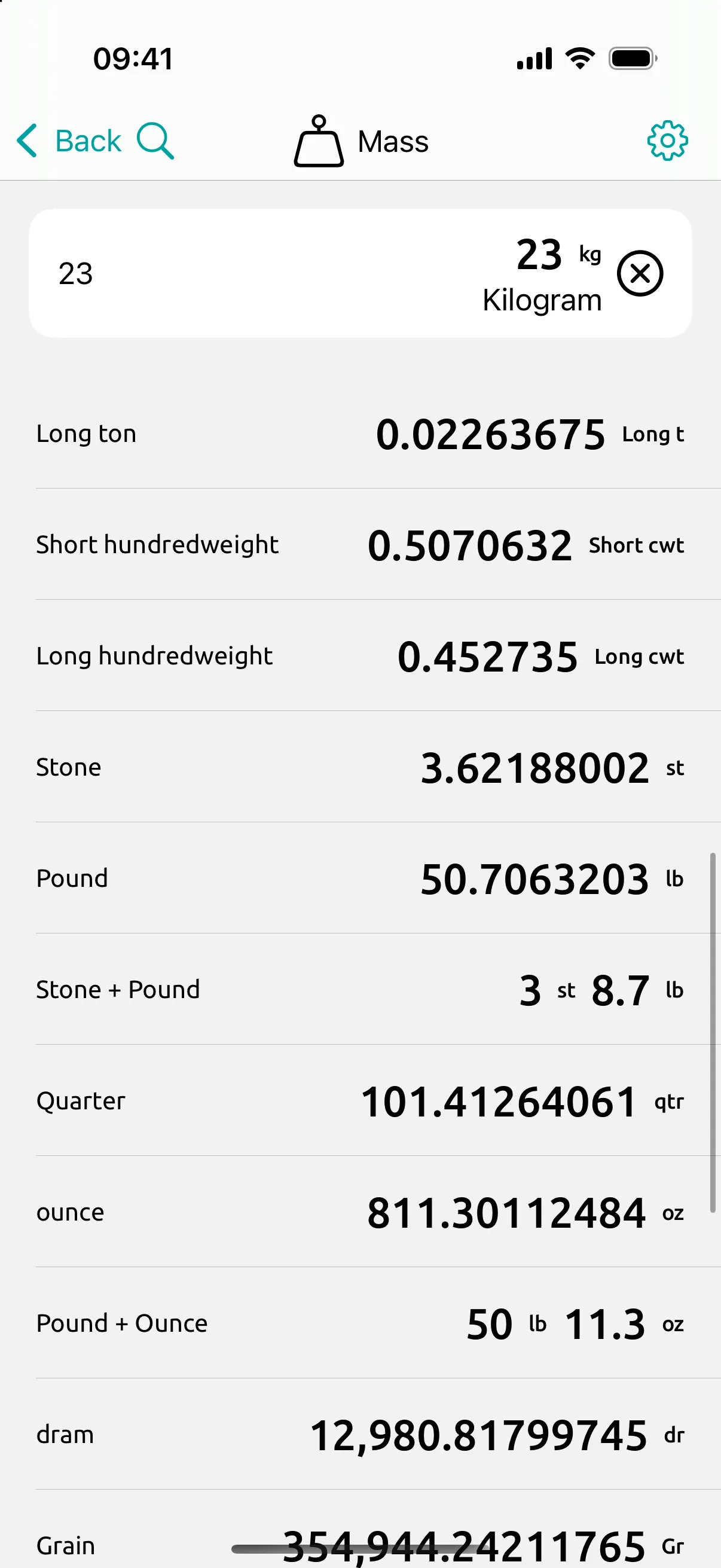 Mass screen: 23 kg typed once, read in every mass unit at once, including 50.7 lb